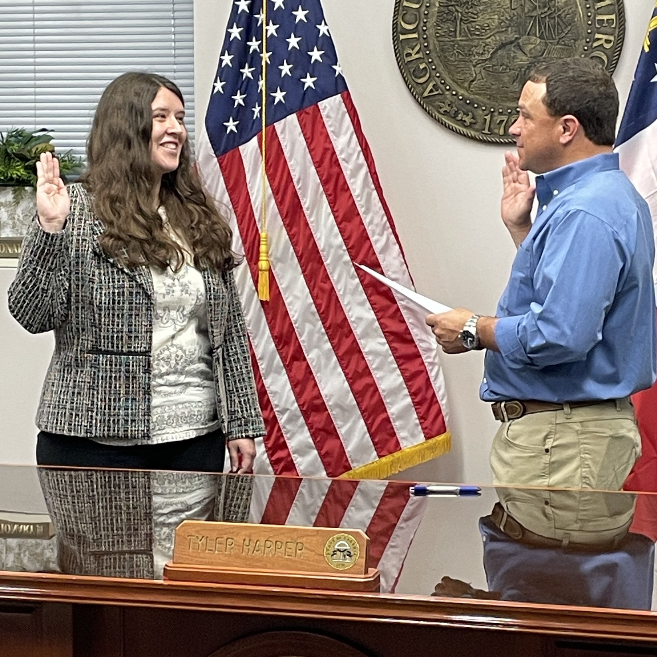 Ali Ikner is sworn in by Georgia Agriculture Commissioner Tyler J. Harper as his designee to the Georgia Structural Pest Control Commission on July 29, 2026. (Photo by the Georgia Department of Agriculture)
